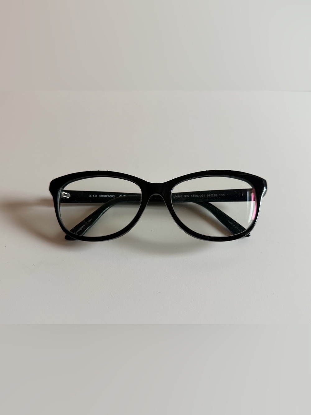 Swarovski Black Oval Women's Eyeglass Frames with Subtle Gloss